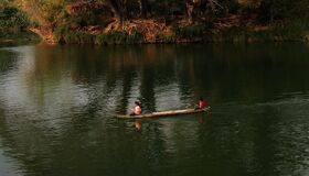 Lush greenery of Don Khong in Laos for a vibrant Don Khong Tours banner with Legend Travel Group.